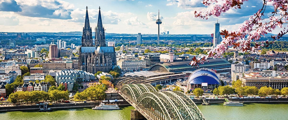 A view over Cologne through spring blossom, Germany
